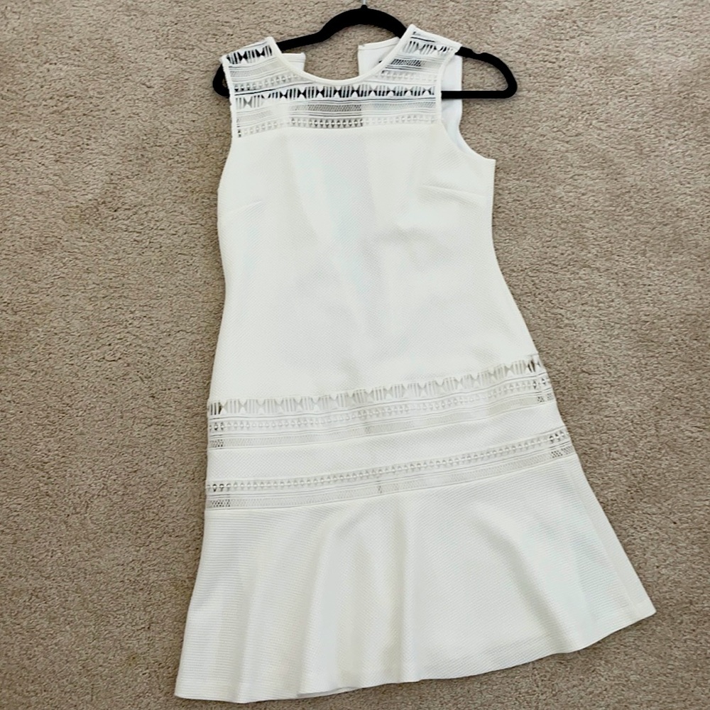 White dress with cut out details